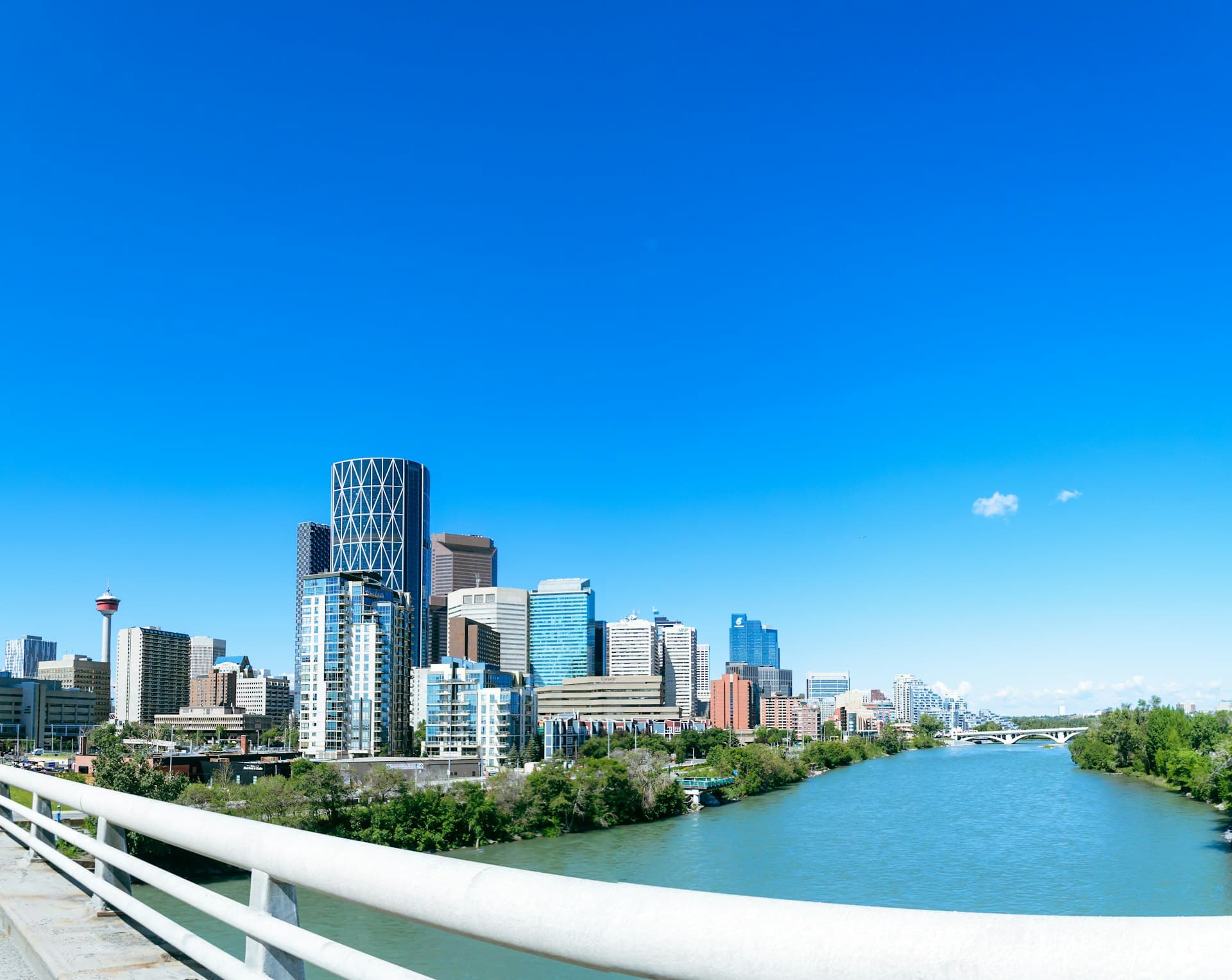Calgary skyline, Calgary Tower, and Bow River — luxury limousine service